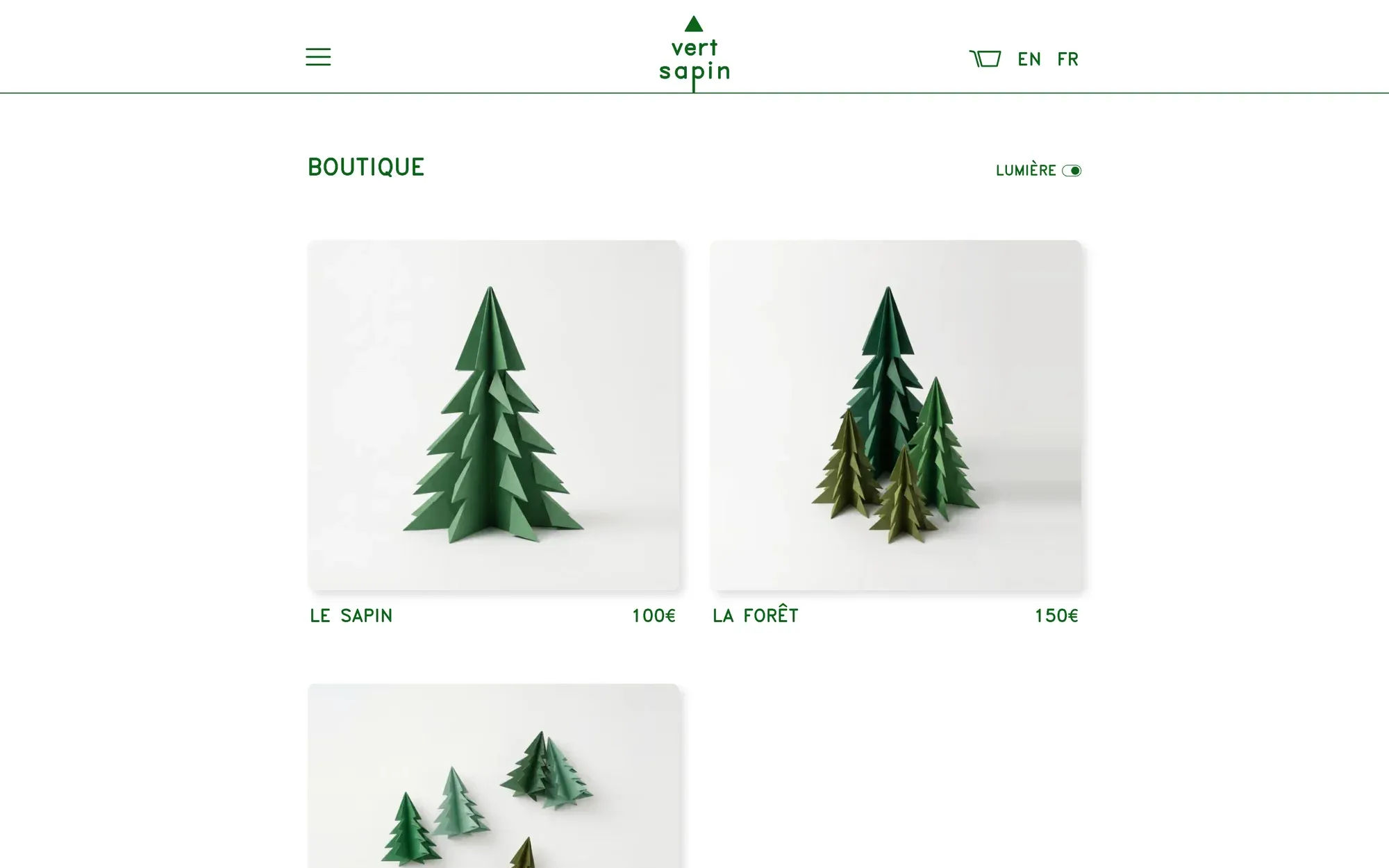 The shop: three photographs of green paper trees on a light ground, with their names and prices.